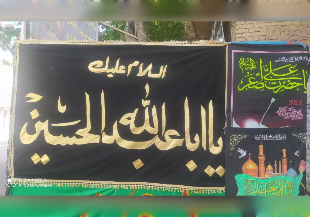 نصب پرچم عزای حسینی در شهر خنداب