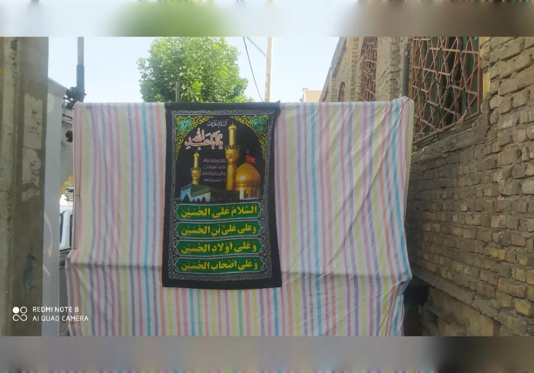 نصب پرچم عزای حسینی در شهر خنداب