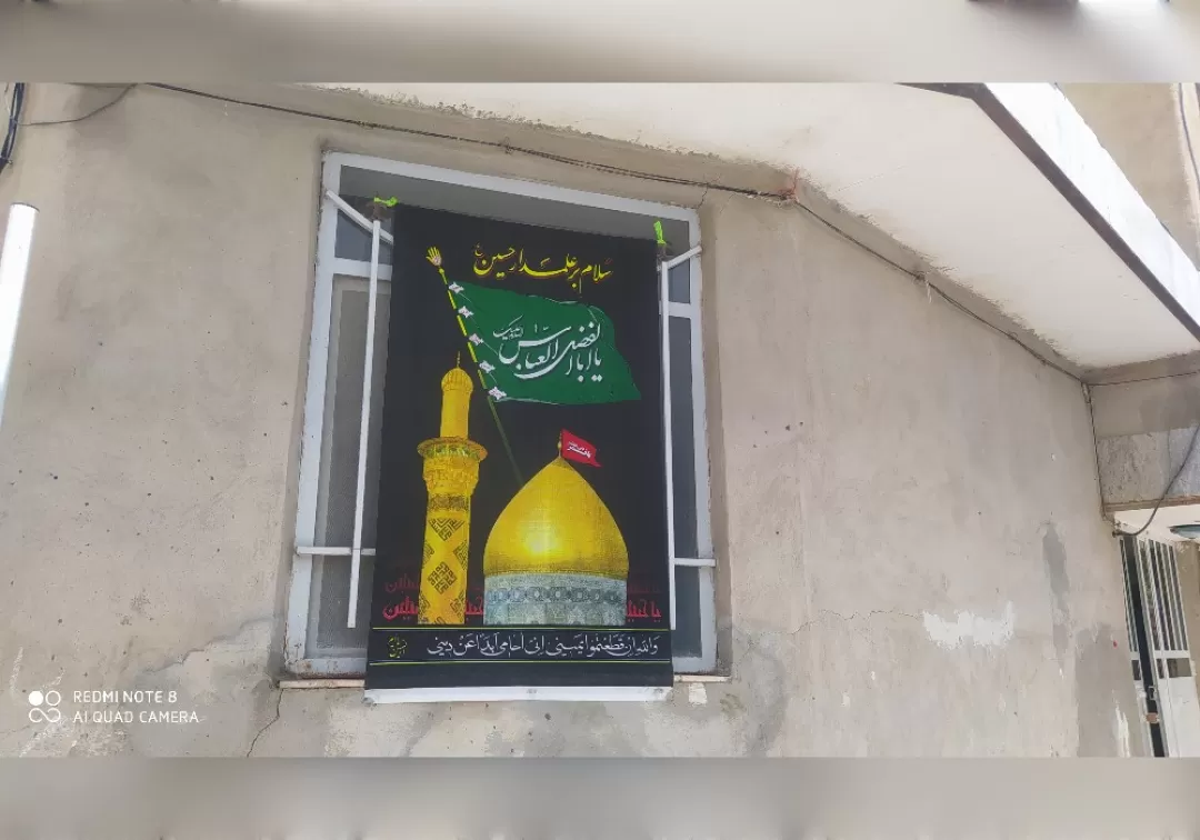 نصب پرچم عزای حسینی در شهر خنداب