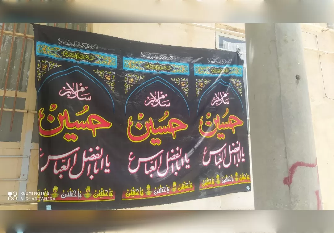 نصب پرچم عزای حسینی در شهر خنداب